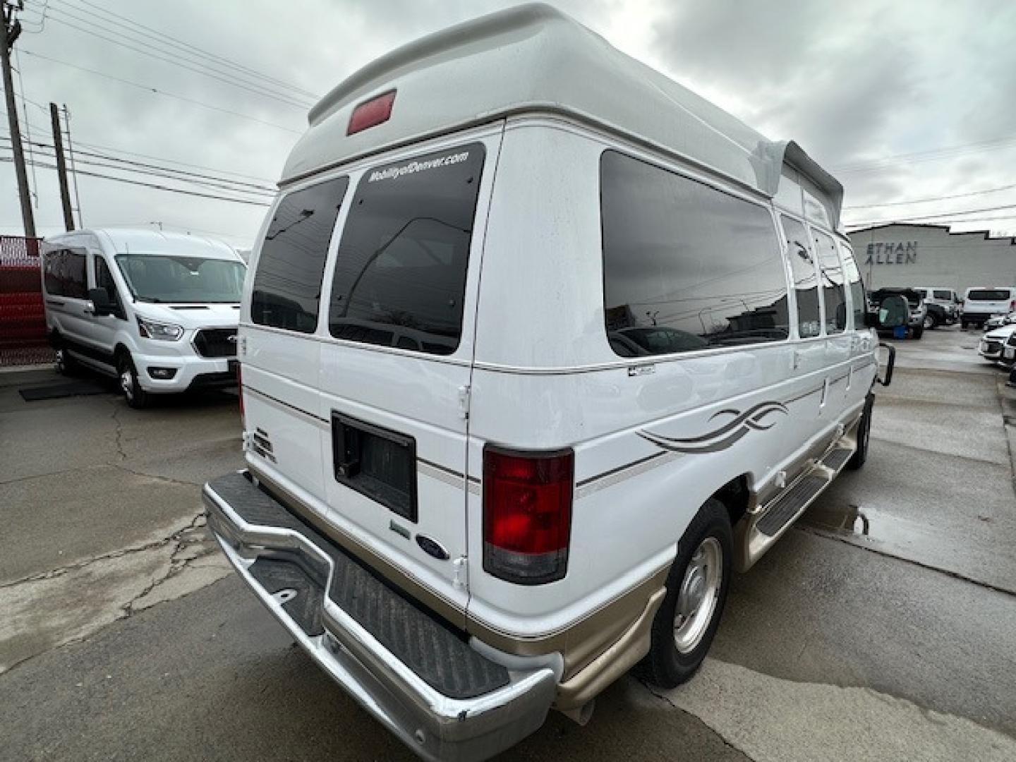 2017 White Ford E Series Van Tuscany Conversion with an 5.4 V8 engine, Automatic transmission, located at 3200 1st Avenue North, Billings, MT, 59101, (406) 245-9055, 45.779270, -108.510742 - Low Mileage, Handicap Accessible Custom Hi-Roof Van. Passenger Side Power Lift with Cargo Doors, 5.4 V8, Running Boards, Designed By Mobility Of Denver and Only 81,000 Miles. CarFax Dealer. Auto Brokers of Montana/AA&A Auto Rental/Fox Car Rental Billings - Photo#7
